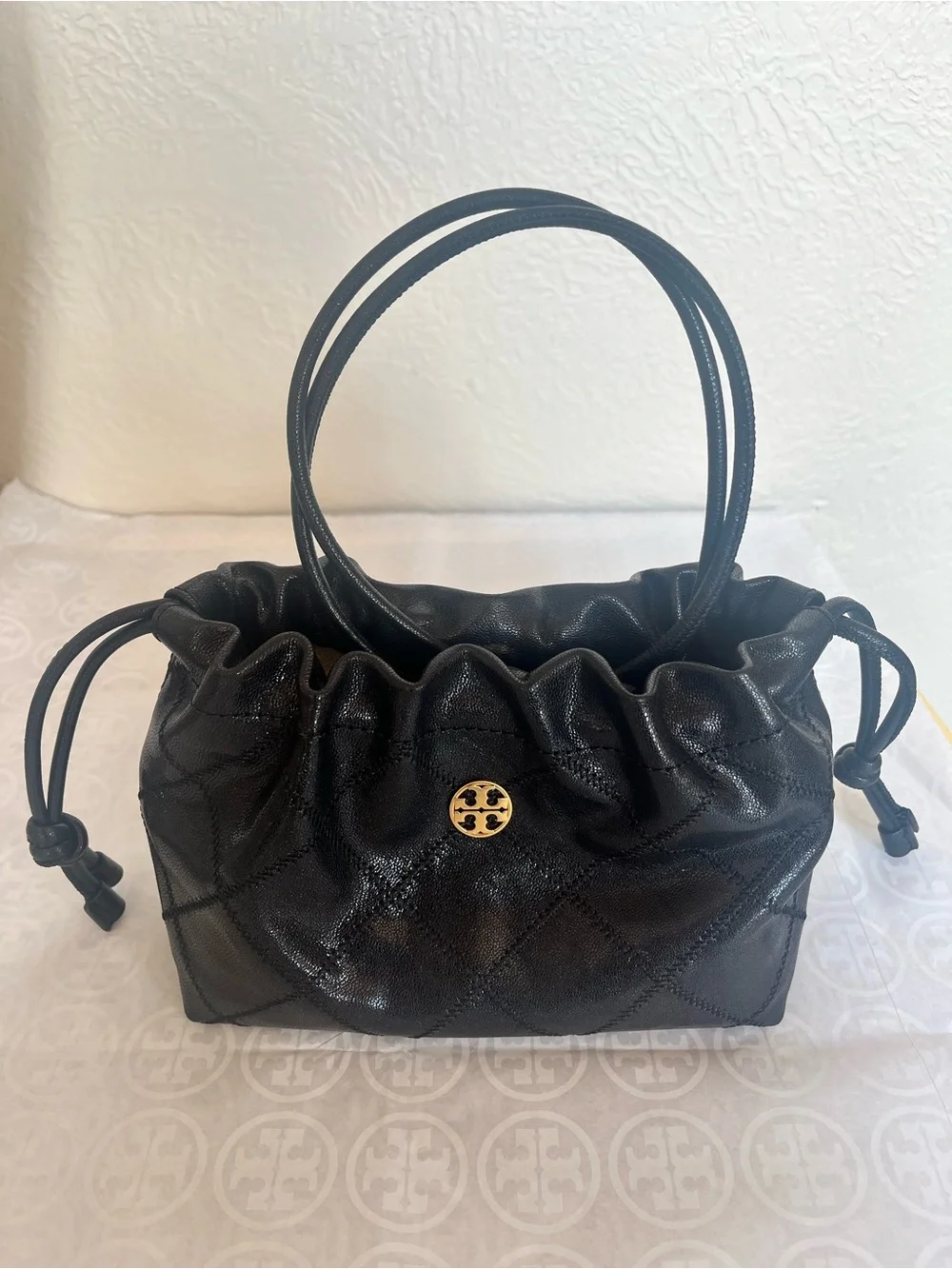 Tory Burch Black Quilted Drawstring Shoulder bag  with Gold Logo